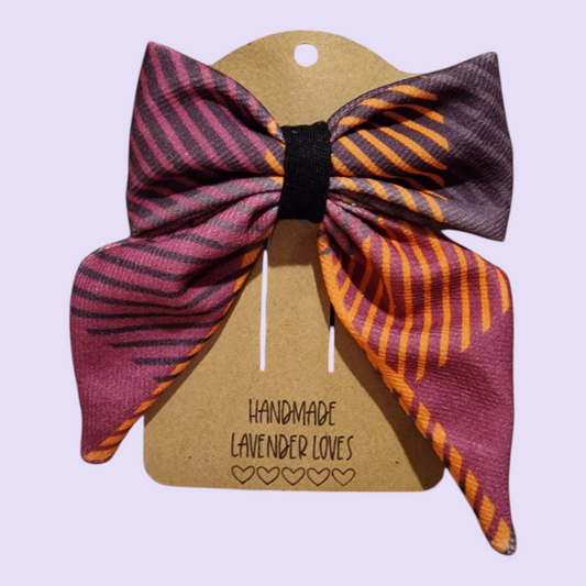 Large fabric hair bow / autumnal tartan